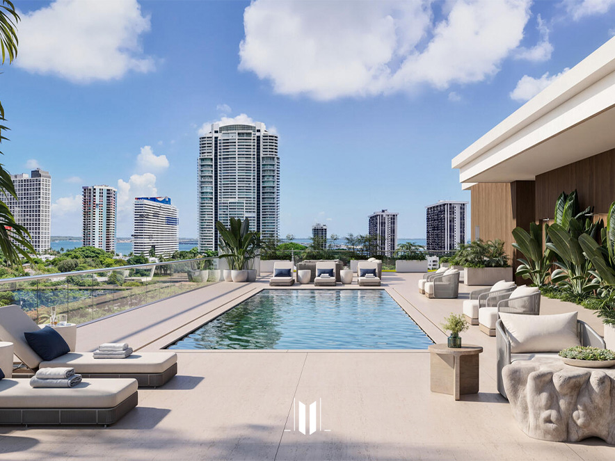 Outdoor pool area at Parkside with modern buildings and clear blue sky