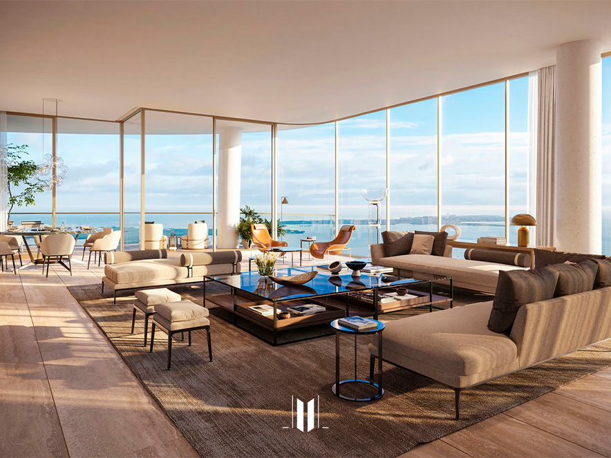 Spacious living room with panoramic windows and modern furniture at The residences at 1428 Brickell